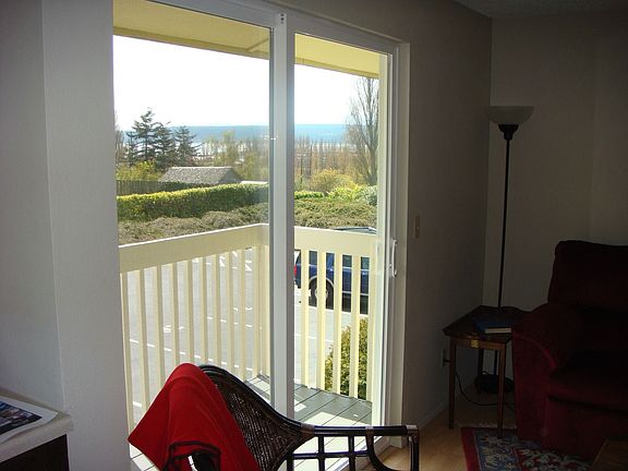 Looking out slider over deck at Bay