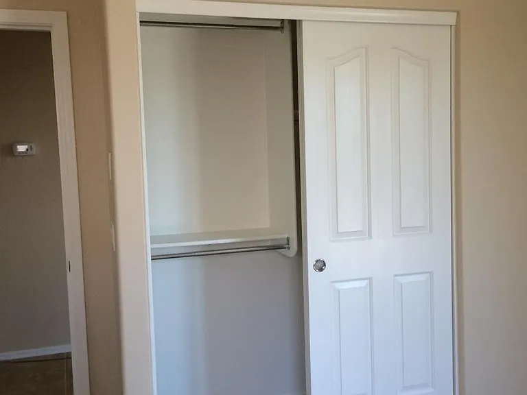 Regular closet in primary bedroom