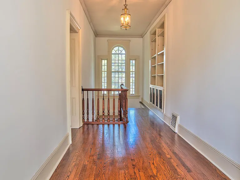 Spacious hallway with storage