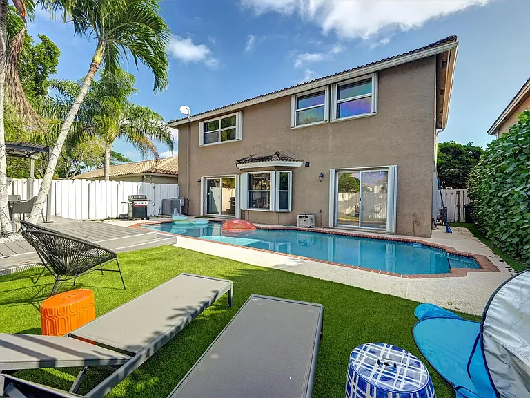 9581 NW 9th Ct — Photo 39