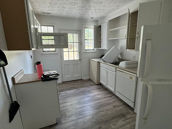 All the doors are open due to being cleaned. This is the Kitchen