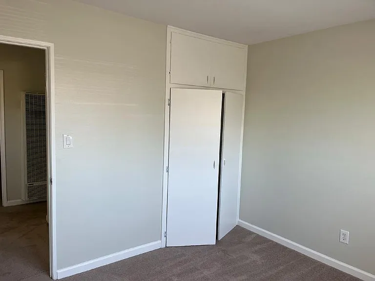 Closets of the other of 2 front-side bedrooms