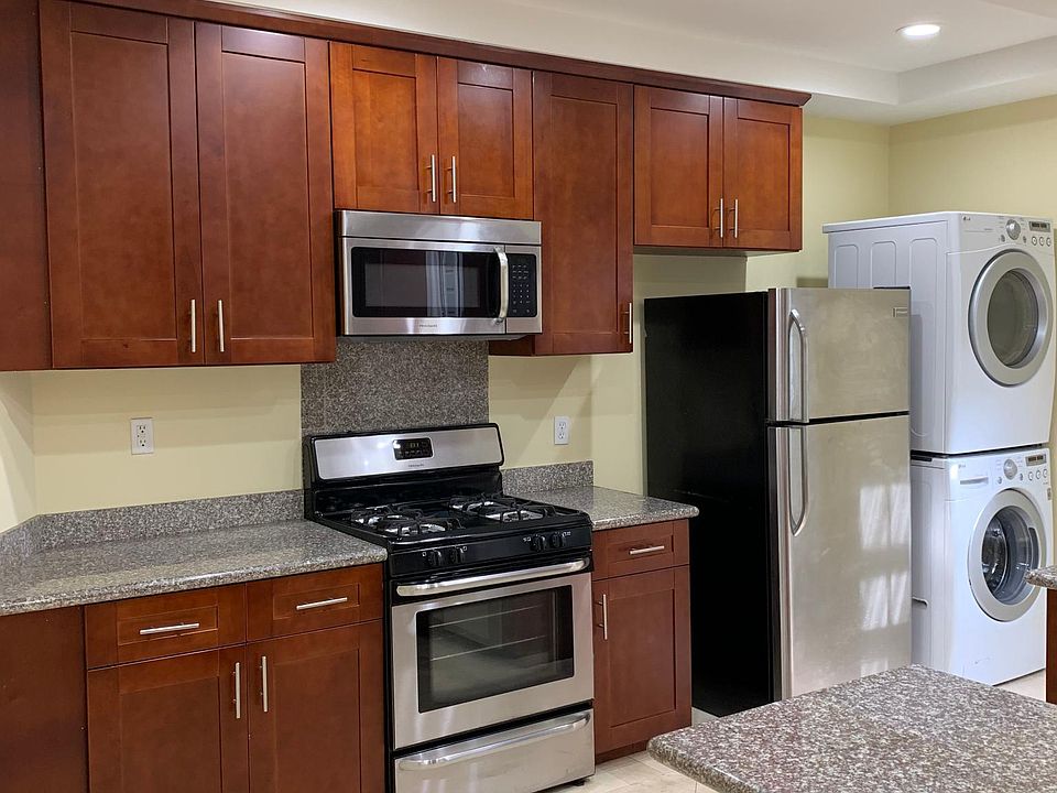 Kitchen with in unit washer and dryer (See next picture for sink area)
