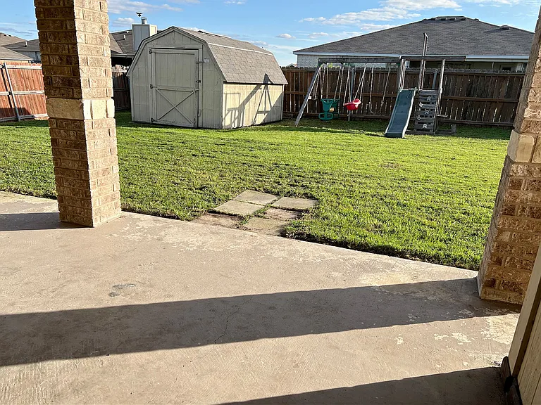Back yard locking storage shed & swing set