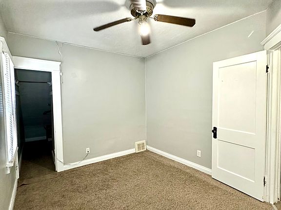 Bedroom 1 w/ Walk in Closet.