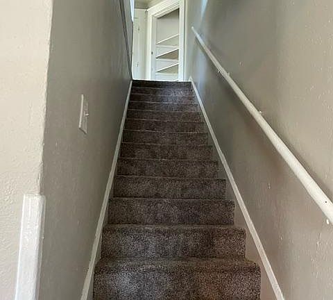 stairs leadings to bedrooms