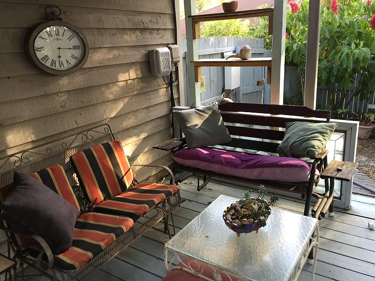 Back deck. Older photos have blue floor. Deck has recently been painted black and stenciled. because I'm just cool that way...