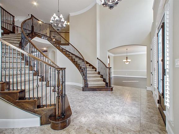 A CONTEMPORARY/MODERN LOOK WITH STUNNING GREY TILE AND COMPLIMENTED WITH PORCELAIN TILE AND ENGINEERED WOOD FLOORS THROUGHOUT.