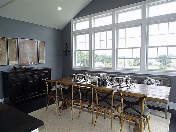 Sunshine streams through the walls of windows. Enjoy beautiful country views from the morning room off of the kitchen. The Dutch