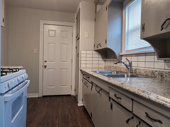 Dishwasher is to the right of the stove