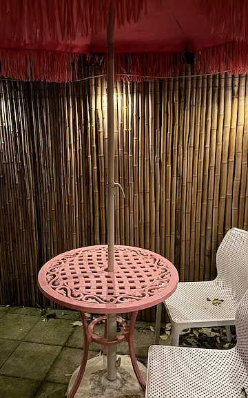 One pink table and 2 white tables total