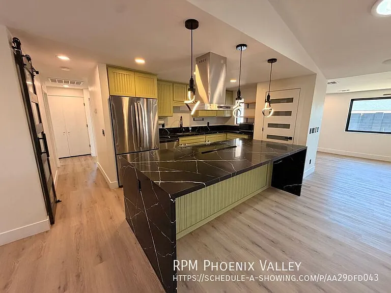 4019 E Surrey Ave — Photo 2
