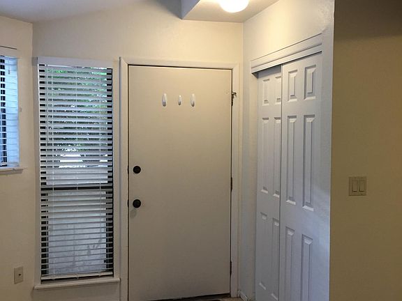 Entryway closet and behind-the-door hooks.