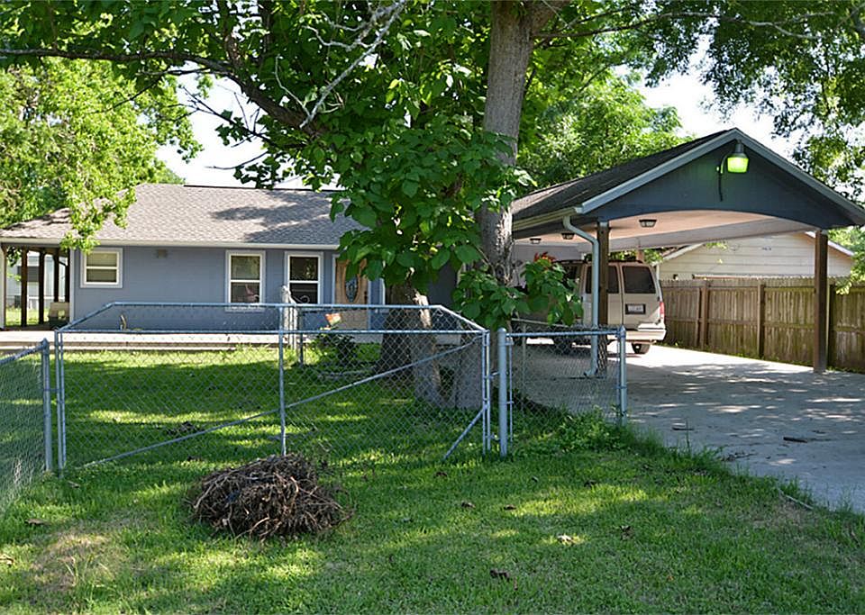 One bedroom, one bath, fully fenced with two car carport