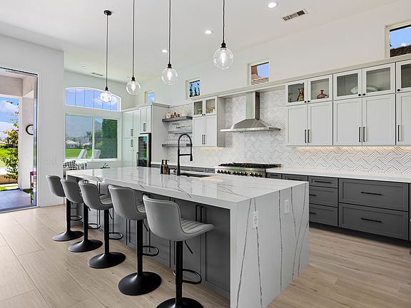 Seating for five on the expansive kitchen island.