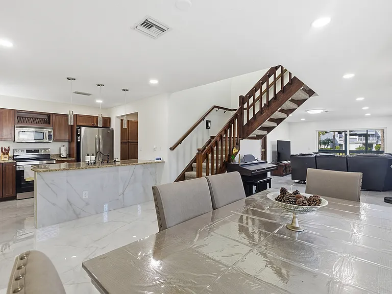 lower level - dining, open kitchen, living area