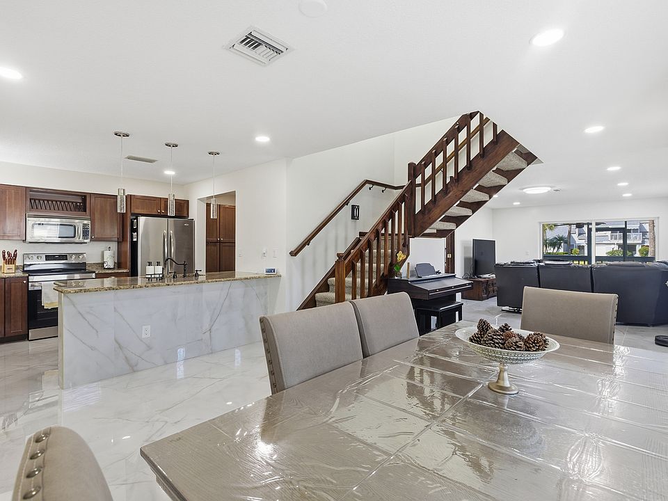 lower level - dining, open kitchen, living area