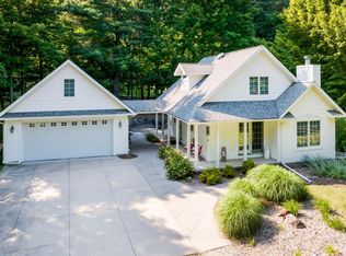10946 SW Torch Lake Dr, Rapid City, MI 49676
