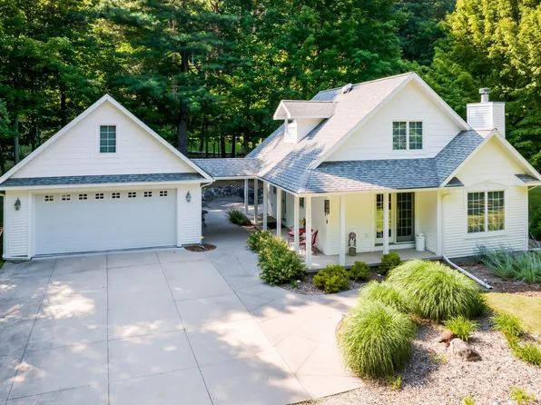 10946 SW Torch Lake Dr, Rapid City, MI 49676