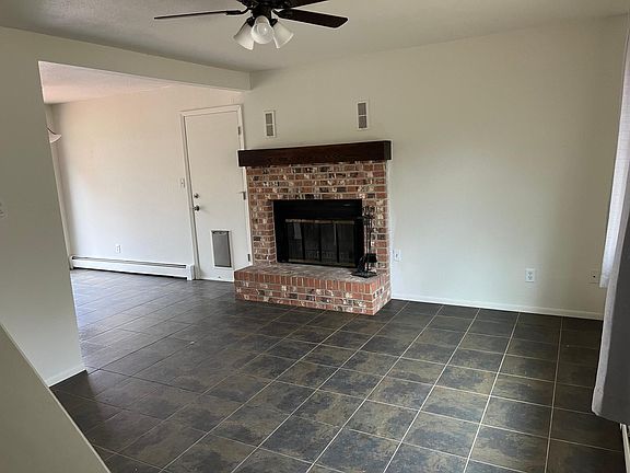 Living area with wood burning fire place