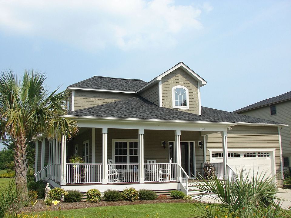 Front Exterior & Lush Landscaping