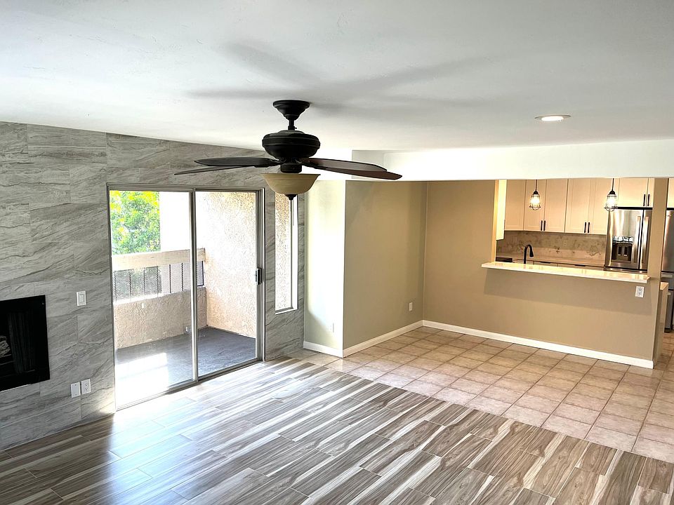 Huge living room, fireplace, balcony, storage closet on the balcony, open flow to kitchen