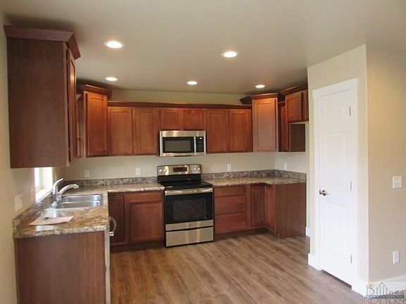 4th image of 7023 Shiny Penny Way