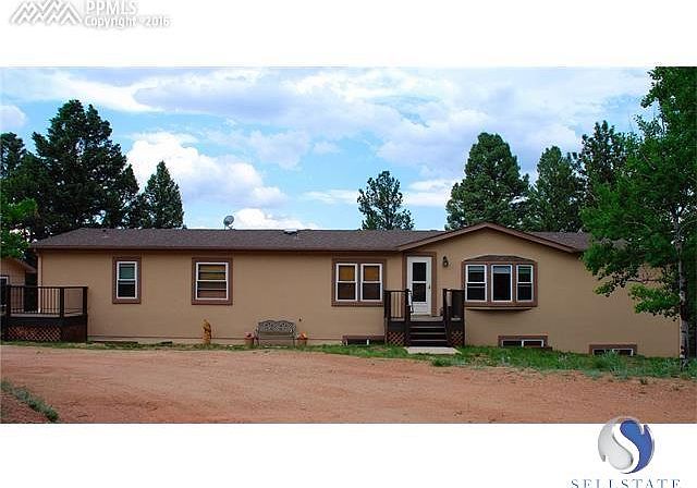 Front of the home w/ new stucco, gutters, exterior paint and new exterior lighting. New decks and doors
