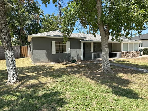 Front elevation with shade trees
