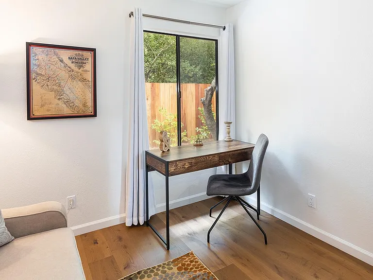 Dedicated office space with two large monitors available
