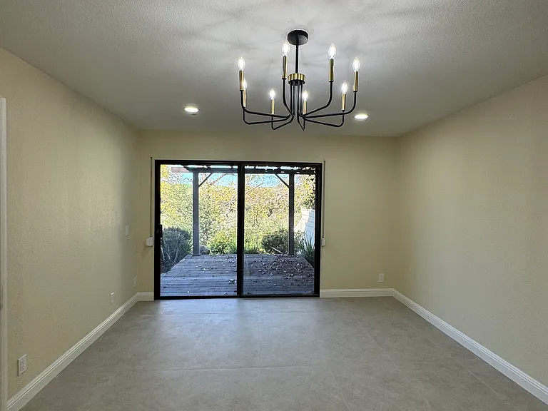 Primary bedroom with private access to backyard