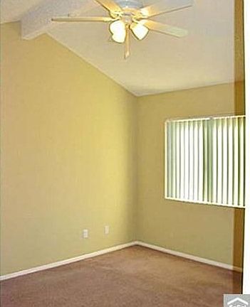 Bedroom with ceiling fans