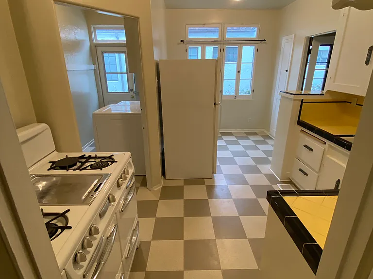 KITCHEN, NOOK AND LAUNDRY VIEW