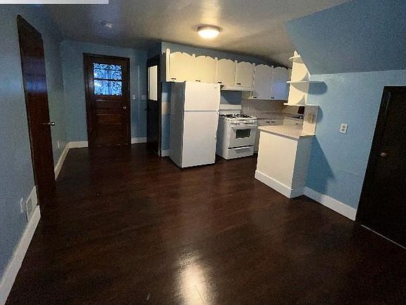 Dining room looking towards the entrance and deck