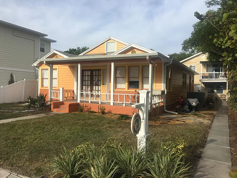 Second floor rear unit for rent, with bedroom private deck, facing Tampa Bay and Lassing Park..
