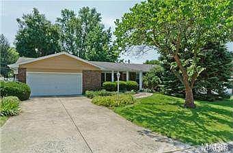 Brick front and covered Front Porch.