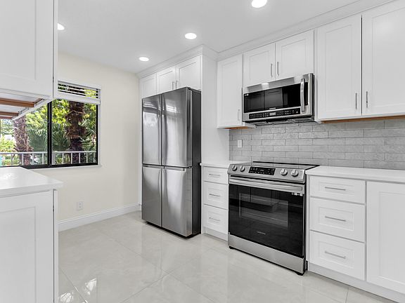 4th image of 7320 Amberly Lane #208
