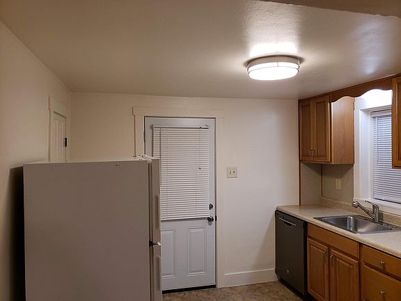 Rear door & basement door in Kitchen
