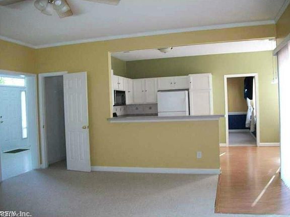 Den to kitchen from previous rental pics