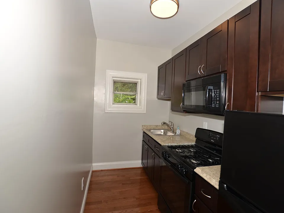 Newly renovated kitchen with cocoa cabinets galore!