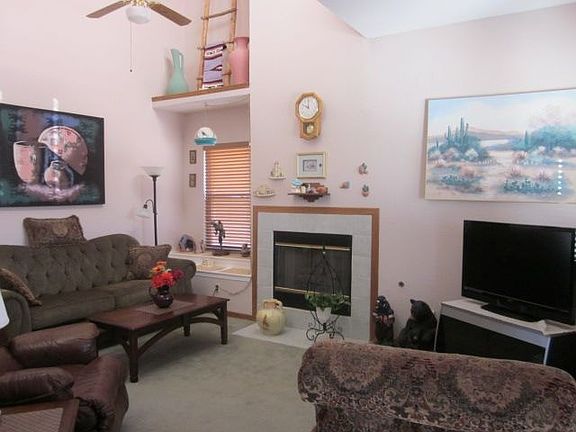 Cozy Den With Fireplace