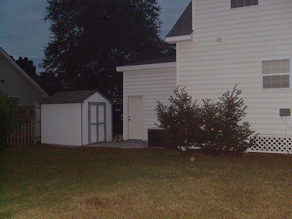 Side with storage building