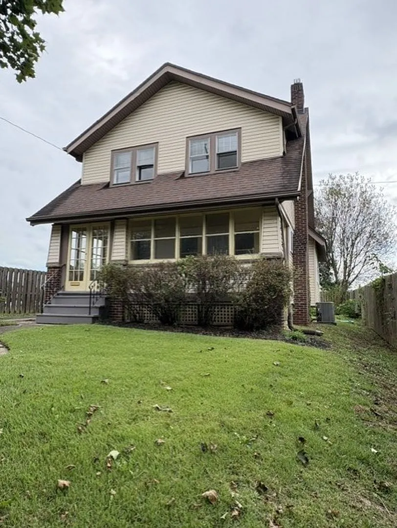 Beautiful 3BR/1.5BA Akron Home | Updated Kitchen | Garage | Enclosed Porch — Photo 2