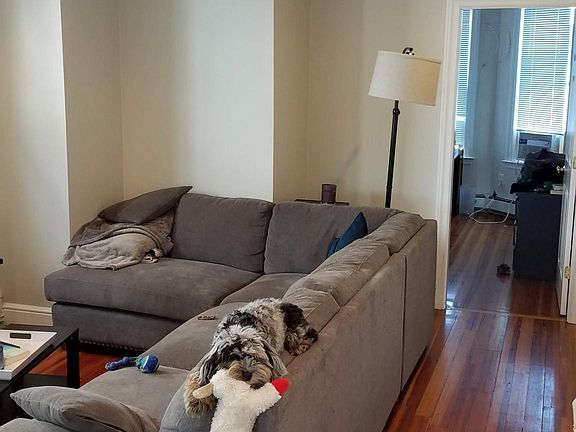 View of Living room From Kitchen. Master BR at rear