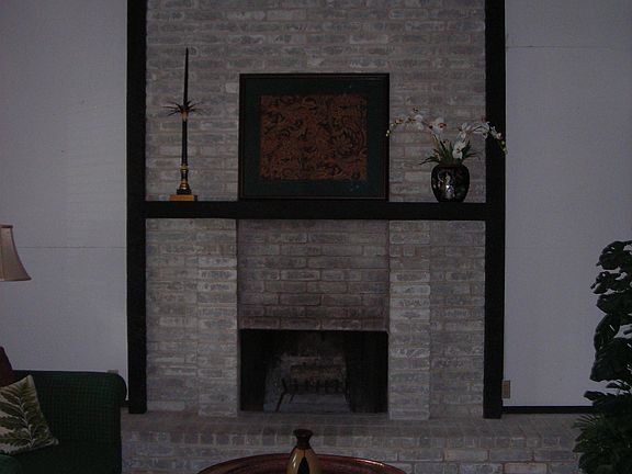 Dramatic wood burn fireplace