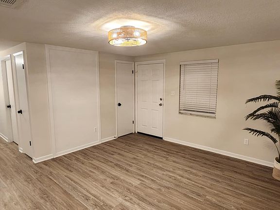 Living room with shiplap feature wall