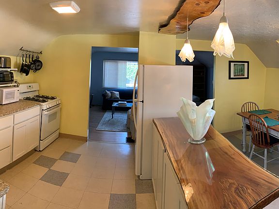 kitchen and live edge island, and dining area