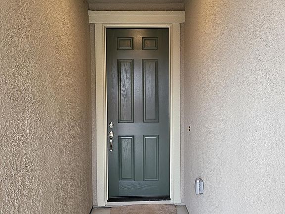 Front Entrance of the Home for rent - 8 foot entry door, 5 beds, 2 baths, 1,773 Square Feet