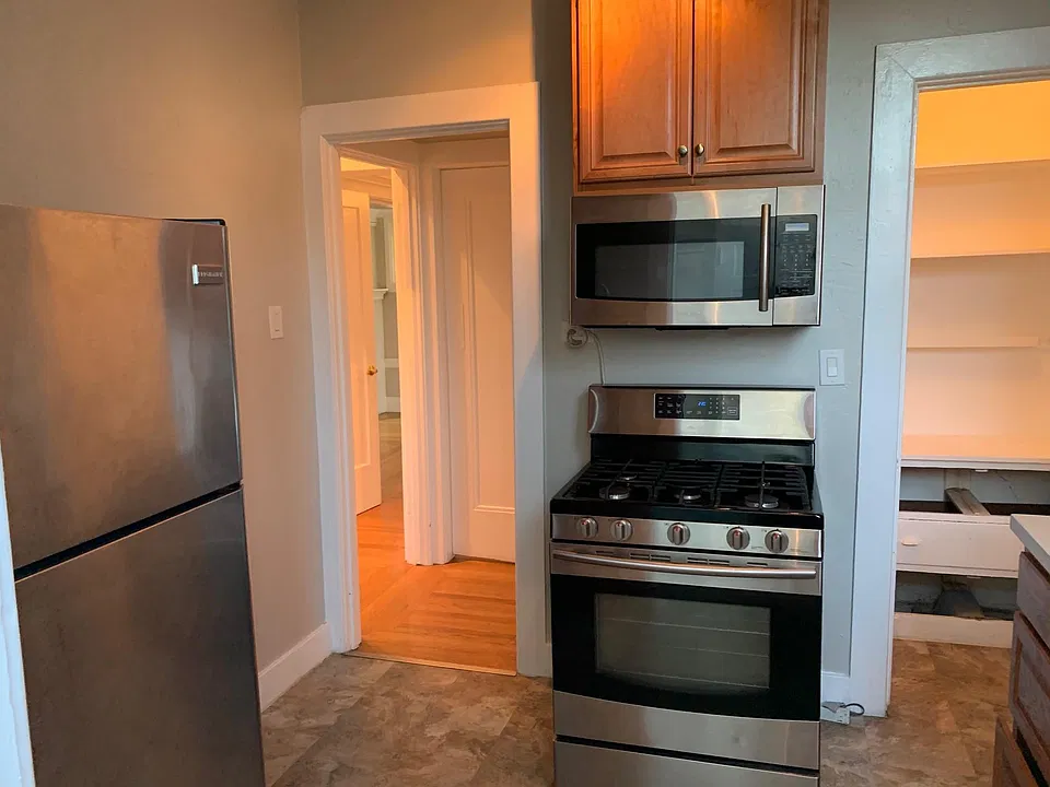 Kitchen with Pantry and stainless steel appliances