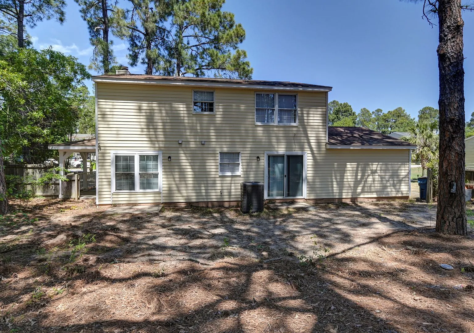 Spacious 3BR Home with Covered Front Porch & Expansive Backyard Near Dining & Shopping — Photo 3